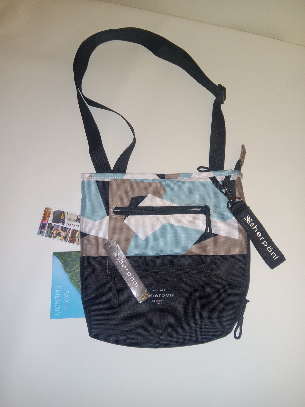 Sherpani Geo Print Crossbody Bag in Blue, Tan, Black & White